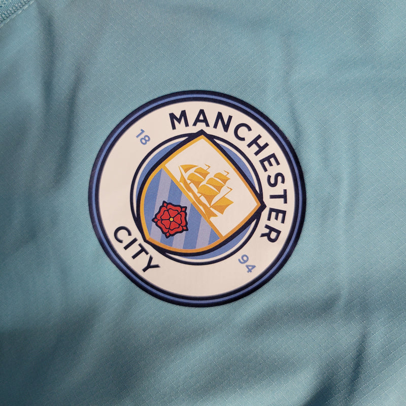 Chaqueta cortavientos Manchester City 23/24 azul y blanco